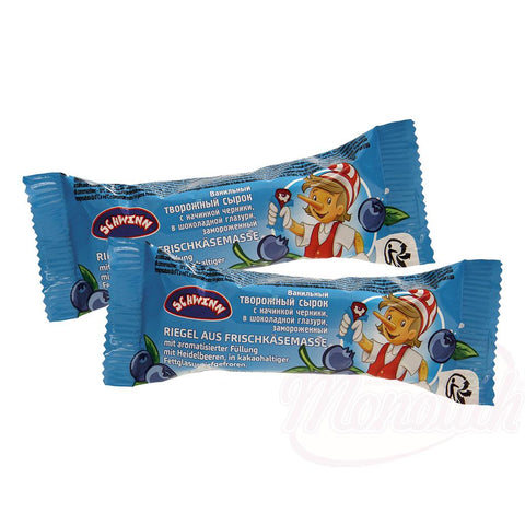 Reep gemaakt van verse kaasbereiding, gevuld met gearomatiseerde bosbessen, bedekt met cacaoglazuur, bevroren.