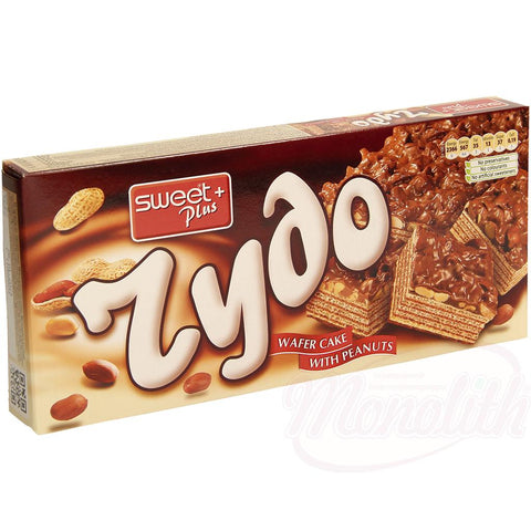 Gâteau gaufré à la crème de cacao (45,3 %) et aux arachides hachées (19%) dans un glaçage gras contenant du cacao (25%)
