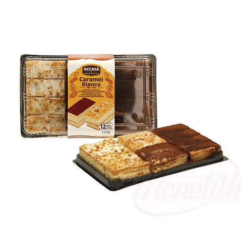 Tartelettes génoise avec 37,5% de crème goût de caramel, avec poudre à base de cacao & Tartelettes génoise avec 37,5% de crème goût vanilie, décoré du glaçage blanc et de arachides hachées